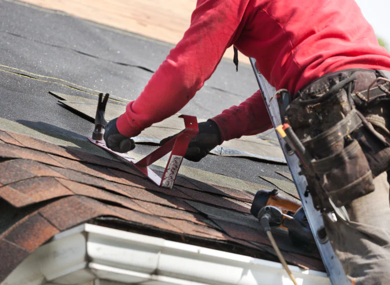 worker doing roof repair